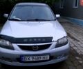 Серый Мазда 323, объемом двигателя 2 л и пробегом 335 тыс. км за 2000 $, фото 1 на Automoto.ua