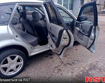 Серый Мазда 323, объемом двигателя 1.6 л и пробегом 200 тыс. км за 1800 $, фото 5 на Automoto.ua