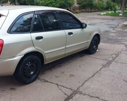 Серый Мазда 323, объемом двигателя 1.3 л и пробегом 280 тыс. км за 2150 $, фото 5 на Automoto.ua