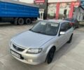 Сірий Мазда 323, об'ємом двигуна 2 л та пробігом 320 тис. км за 1300 $, фото 1 на Automoto.ua