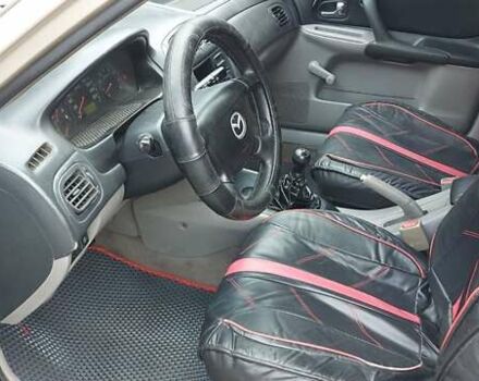 Серый Мазда 323, объемом двигателя 1.3 л и пробегом 280 тыс. км за 2150 $, фото 6 на Automoto.ua