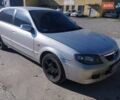 Серый Мазда 323, объемом двигателя 2 л и пробегом 360 тыс. км за 2200 $, фото 3 на Automoto.ua