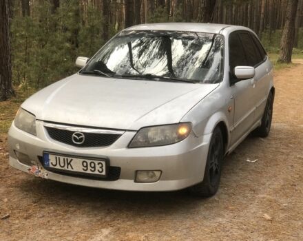 Серый Мазда 323, объемом двигателя 2 л и пробегом 358 тыс. км за 1200 $, фото 1 на Automoto.ua