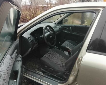 Серый Мазда 323, объемом двигателя 1.6 л и пробегом 447 тыс. км за 1500 $, фото 5 на Automoto.ua