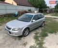 Серый Мазда 323, объемом двигателя 2 л и пробегом 268 тыс. км за 1400 $, фото 1 на Automoto.ua