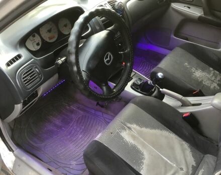 Серый Мазда 323, объемом двигателя 0 л и пробегом 358 тыс. км за 850 $, фото 5 на Automoto.ua