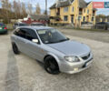 Серый Мазда 323, объемом двигателя 2 л и пробегом 305 тыс. км за 2000 $, фото 1 на Automoto.ua