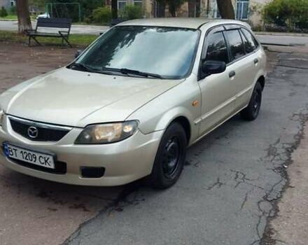 Серый Мазда 323, объемом двигателя 1.3 л и пробегом 280 тыс. км за 2150 $, фото 4 на Automoto.ua