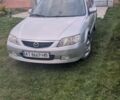 Серый Мазда 323, объемом двигателя 1.6 л и пробегом 250 тыс. км за 3000 $, фото 1 на Automoto.ua
