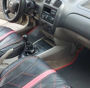 Серый Мазда 323, объемом двигателя 1.3 л и пробегом 280 тыс. км за 2150 $, фото 3 на Automoto.ua