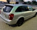 Серый Мазда 323, объемом двигателя 2 л и пробегом 341 тыс. км за 900 $, фото 1 на Automoto.ua