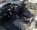 Серый Мазда 323, объемом двигателя 2 л и пробегом 250 тыс. км за 1000 $, фото 3 на Automoto.ua
