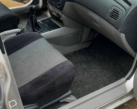 Серый Мазда 323, объемом двигателя 2 л и пробегом 230 тыс. км за 700 $, фото 5 на Automoto.ua