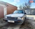Серый Мазда 323, объемом двигателя 1.5 л и пробегом 65 тыс. км за 1500 $, фото 1 на Automoto.ua