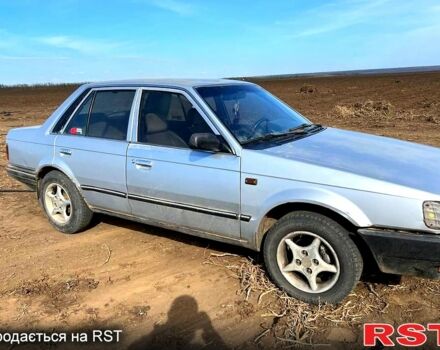 Серый Мазда 323, объемом двигателя 1.3 л и пробегом 123 тыс. км за 700 $, фото 4 на Automoto.ua