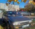 Серый Мазда 323, объемом двигателя 1.3 л и пробегом 300 тыс. км за 1100 $, фото 1 на Automoto.ua