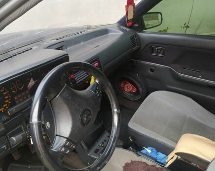 Сірий Мазда 323, об'ємом двигуна 1.7 л та пробігом 400 тис. км за 1000 $, фото 5 на Automoto.ua