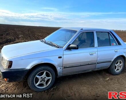 Серый Мазда 323, объемом двигателя 1.3 л и пробегом 123 тыс. км за 700 $, фото 3 на Automoto.ua
