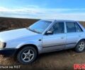Серый Мазда 323, объемом двигателя 1.3 л и пробегом 123 тыс. км за 700 $, фото 3 на Automoto.ua