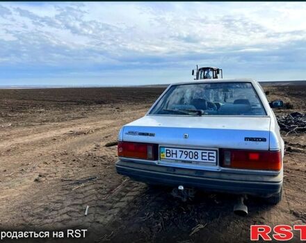 Серый Мазда 323, объемом двигателя 1.3 л и пробегом 123 тыс. км за 700 $, фото 2 на Automoto.ua