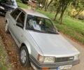 Серый Мазда 323, объемом двигателя 1.3 л и пробегом 300 тыс. км за 1000 $, фото 1 на Automoto.ua