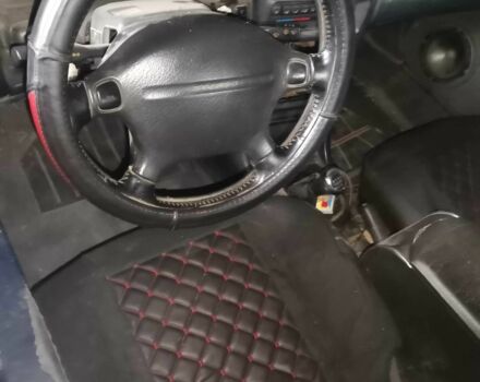 Серый Мазда 323, объемом двигателя 2 л и пробегом 200 тыс. км за 306 $, фото 3 на Automoto.ua