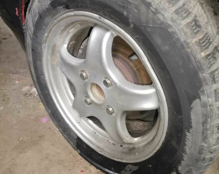 Серый Мазда 323, объемом двигателя 2 л и пробегом 200 тыс. км за 306 $, фото 1 на Automoto.ua