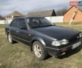 Серый Мазда 323, объемом двигателя 1.5 л и пробегом 600 тыс. км за 850 $, фото 1 на Automoto.ua