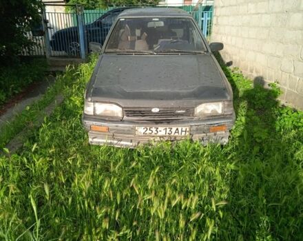 Серый Мазда 323, объемом двигателя 0 л и пробегом 999 тыс. км за 270 $, фото 1 на Automoto.ua