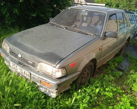 Серый Мазда 323, объемом двигателя 0 л и пробегом 999 тыс. км за 270 $, фото 2 на Automoto.ua