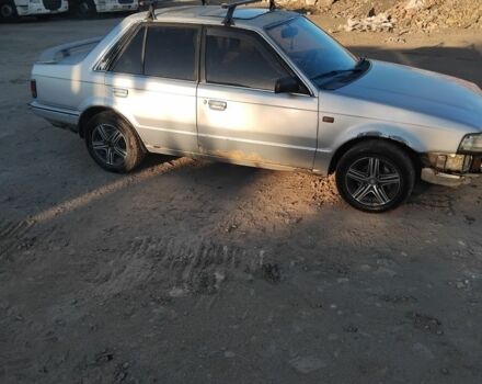 Серый Мазда 323, объемом двигателя 1.6 л и пробегом 347 тыс. км за 500 $, фото 2 на Automoto.ua