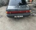 Серый Мазда 323, объемом двигателя 1.6 л и пробегом 250 тыс. км за 711 $, фото 1 на Automoto.ua