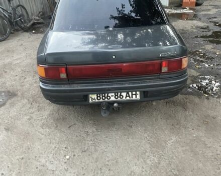 Серый Мазда 323, объемом двигателя 1.6 л и пробегом 150 тыс. км за 1500 $, фото 3 на Automoto.ua