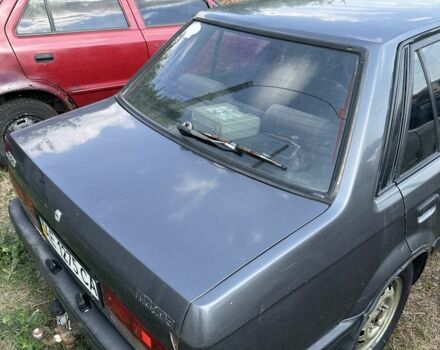 Сірий Мазда 323, об'ємом двигуна 1.6 л та пробігом 200 тис. км за 400 $, фото 2 на Automoto.ua