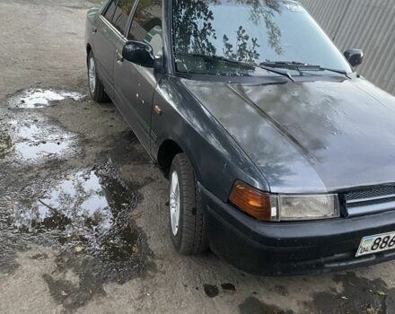 Серый Мазда 323, объемом двигателя 1.6 л и пробегом 150 тыс. км за 1500 $, фото 2 на Automoto.ua