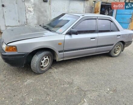 Серый Мазда 323, объемом двигателя 1.3 л и пробегом 130 тыс. км за 2500 $, фото 3 на Automoto.ua