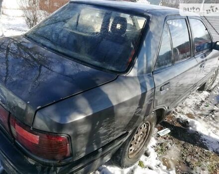 Серый Мазда 323, объемом двигателя 1.6 л и пробегом 450 тыс. км за 700 $, фото 4 на Automoto.ua