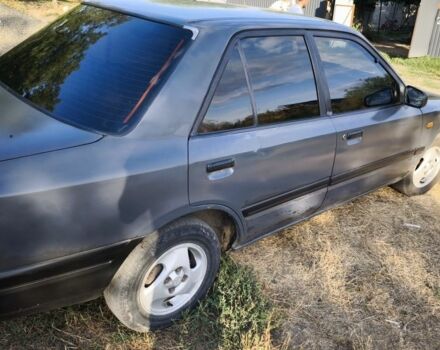 Сірий Мазда 323, об'ємом двигуна 1.3 л та пробігом 260 тис. км за 1600 $, фото 4 на Automoto.ua