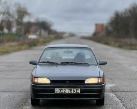 Серый Мазда 323, объемом двигателя 0 л и пробегом 100 тыс. км за 850 $, фото 1 на Automoto.ua