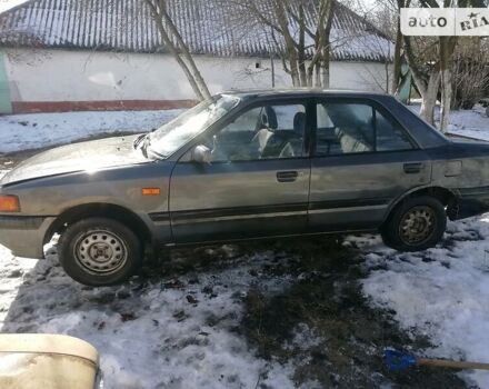 Серый Мазда 323, объемом двигателя 1.6 л и пробегом 450 тыс. км за 700 $, фото 2 на Automoto.ua