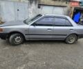 Серый Мазда 323, объемом двигателя 1.3 л и пробегом 130 тыс. км за 2500 $, фото 1 на Automoto.ua