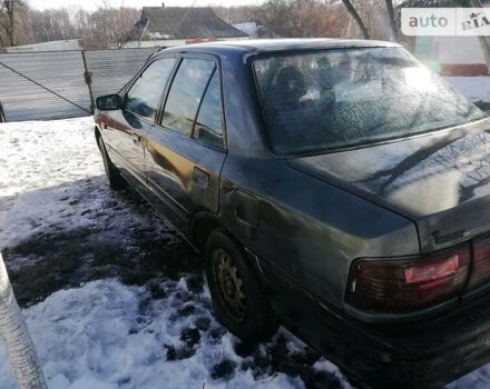 Серый Мазда 323, объемом двигателя 1.6 л и пробегом 450 тыс. км за 700 $, фото 3 на Automoto.ua