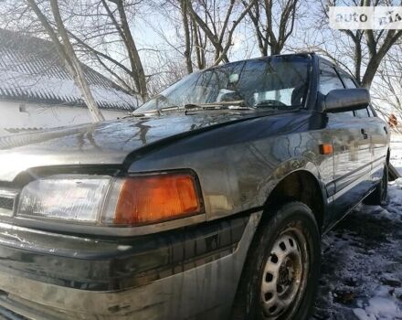 Серый Мазда 323, объемом двигателя 1.6 л и пробегом 450 тыс. км за 700 $, фото 1 на Automoto.ua
