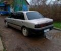 Серый Мазда 323, объемом двигателя 1.3 л и пробегом 389 тыс. км за 1650 $, фото 1 на Automoto.ua