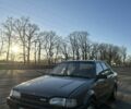 Серый Мазда 323, объемом двигателя 1.4 л и пробегом 111 тыс. км за 950 $, фото 1 на Automoto.ua