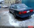 Серый Мазда 323, объемом двигателя 1.5 л и пробегом 318 тыс. км за 1100 $, фото 1 на Automoto.ua