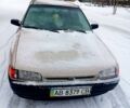 Серый Мазда 323, объемом двигателя 1.3 л и пробегом 300 тыс. км за 620 $, фото 1 на Automoto.ua