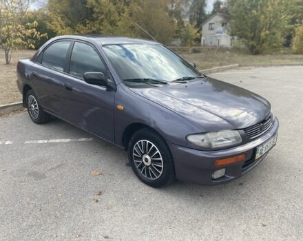 Серый Мазда 323, объемом двигателя 1.5 л и пробегом 370 тыс. км за 1699 $, фото 6 на Automoto.ua