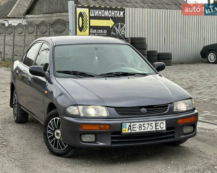 Серый Мазда 323, объемом двигателя 1.5 л и пробегом 320 тыс. км за 1700 $, фото 4 на Automoto.ua