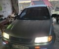Сірий Мазда 323, об'ємом двигуна 1.5 л та пробігом 328 тис. км за 1299 $, фото 1 на Automoto.ua